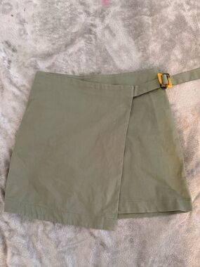 Reserved Olive Green Asymmetrical Skirt with Buckle Detail
